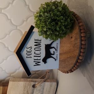 Dogs Welcome, people tolerated sign